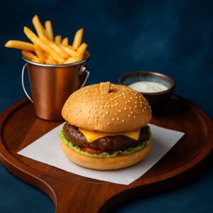 Burger bun, lettuce, tomato, beef bacon , cheddar cheese and truffle mayonnaise.